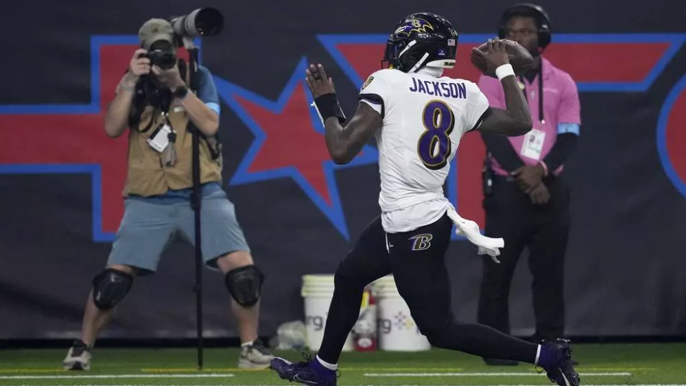 Ravens' Lamar Jackson breaks NFL QB rushing record
