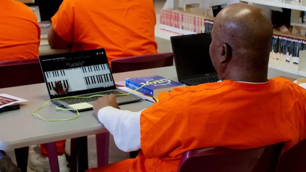 Inmates learn to code in prison