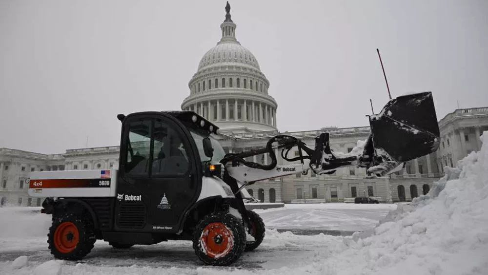 Can Washington handle two weeks of high-security pomp along with a heavy burst of snow?