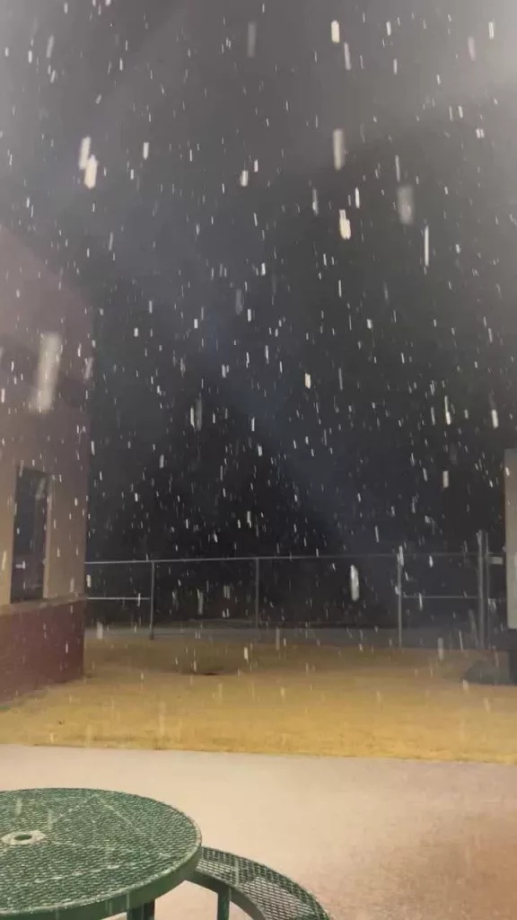 Video shows snow falling in Georgia as authorities warn to stay off the roads