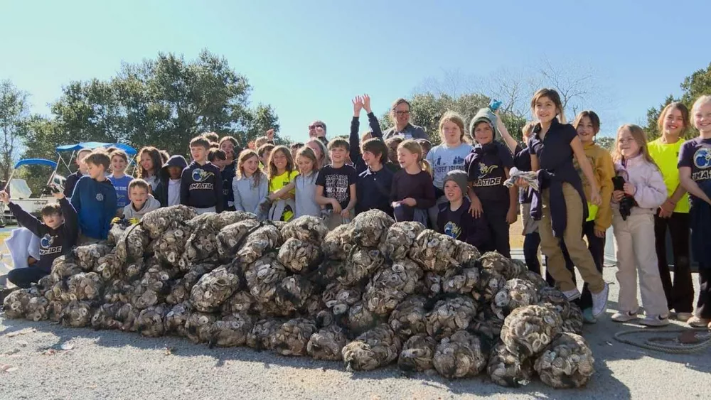 Tybee Island students join oyster shell bagging for shoreline aid