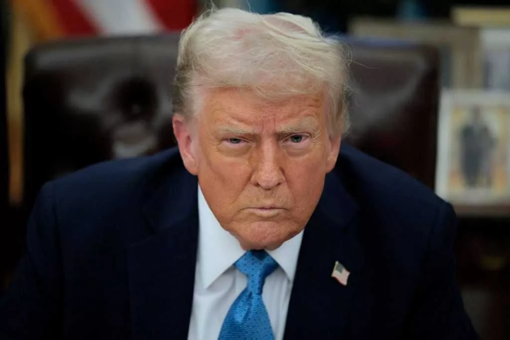 Aid groups sue over Trump's order suspending federal refugee program and funding