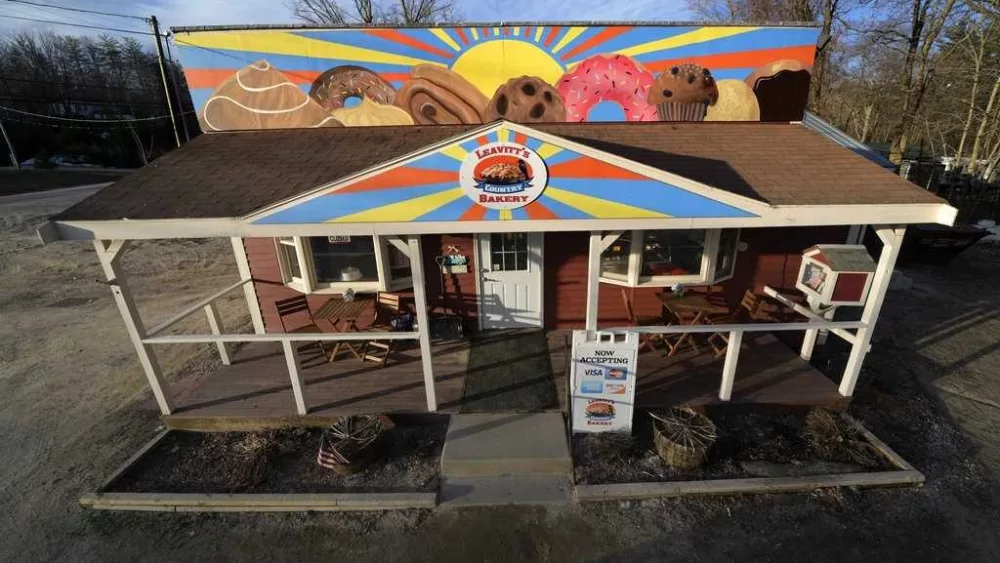 A free speech dispute over a New England town's pastry shop painting heads to trial