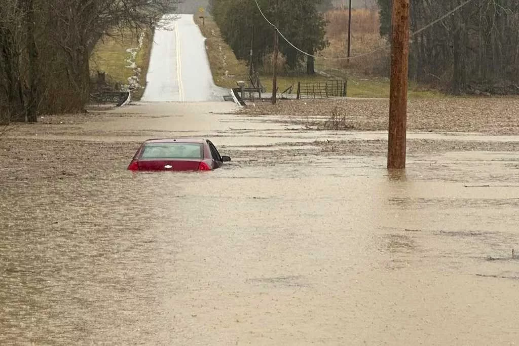 Flooding in US Southeast leaves at least 4 dead; snow, ice and wind cause winter misery elsewhere