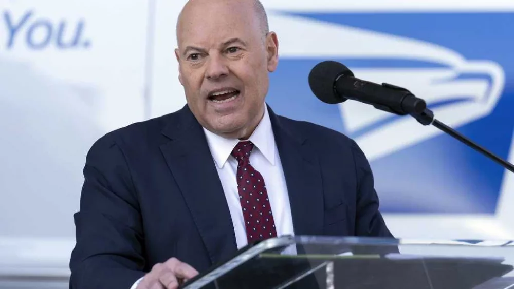 US Postal Service head DeJoy to step down after 5 years marked by pandemic, losses and cost cuts