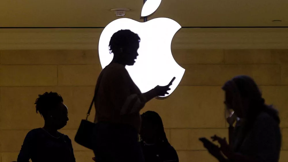 Apple, facing tariffs on Chinese imports, says it will invest $500 billion in US facilities