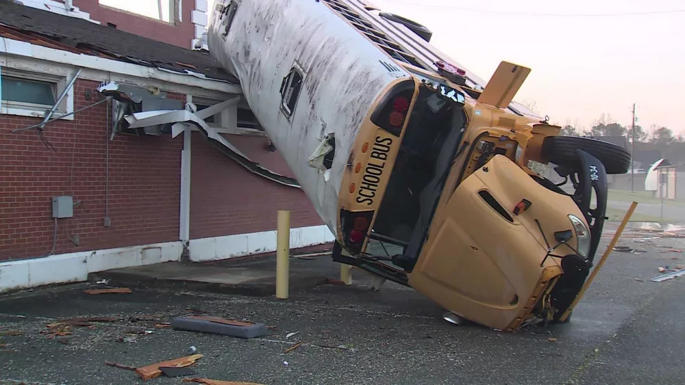 WATCH: Bus thrown into roof of Alabama high school during EF-2 tornado