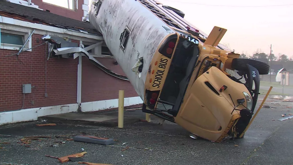 WATCH: Bus thrown into roof of Alabama high school during EF-2 tornado