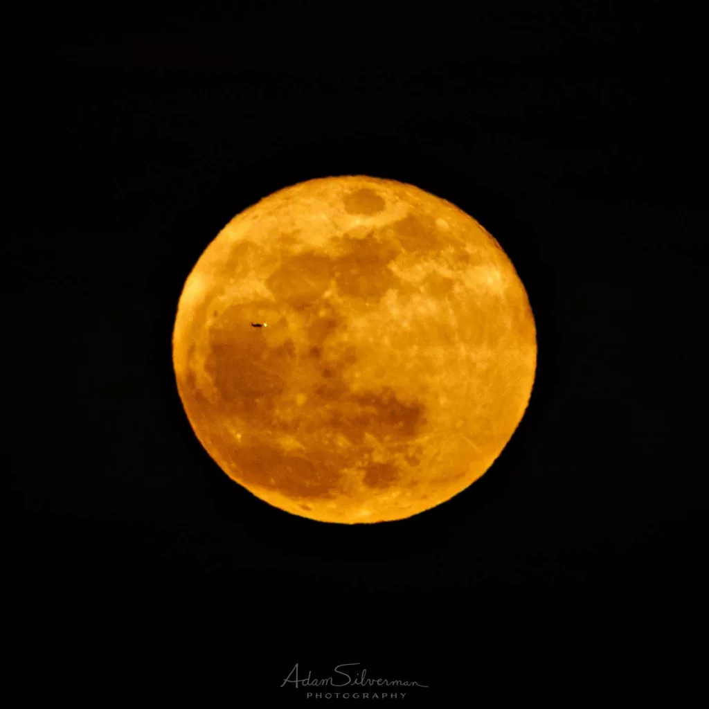 Mystery solved: Social media connects photographer with pilot who photobombed moon photo