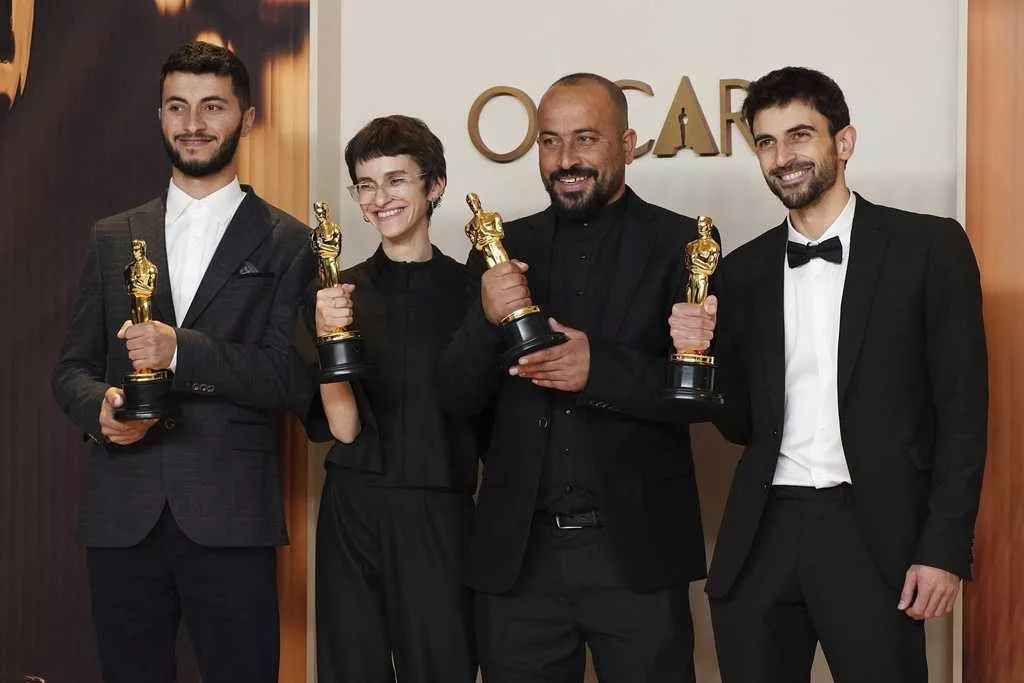 Oscar-winning Palestinian director is attacked by Jewish settlers and detained, activists say
