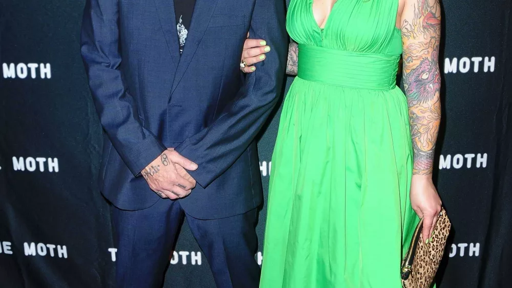 Weezer bassist Scott Shriner's wife arrested on suspicion of attempted murder after being shot by police