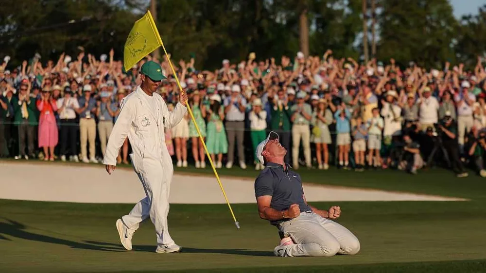 Rory McIlroy completes career grand slam with Masters triumph