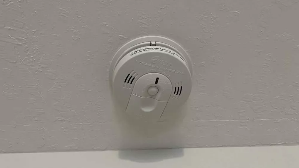 Man accused of hiding camera in smoke detector inadvertently sent image to woman
