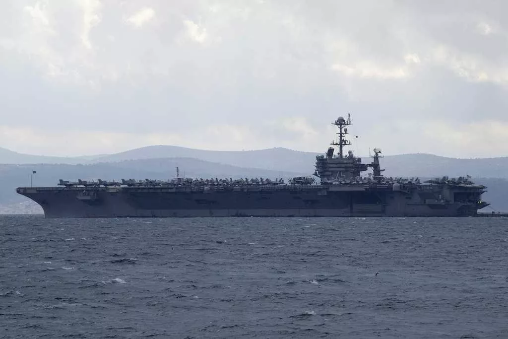 Fighter jet slips off the hangar deck of USS Harry Truman in the Red Sea, US Navy says