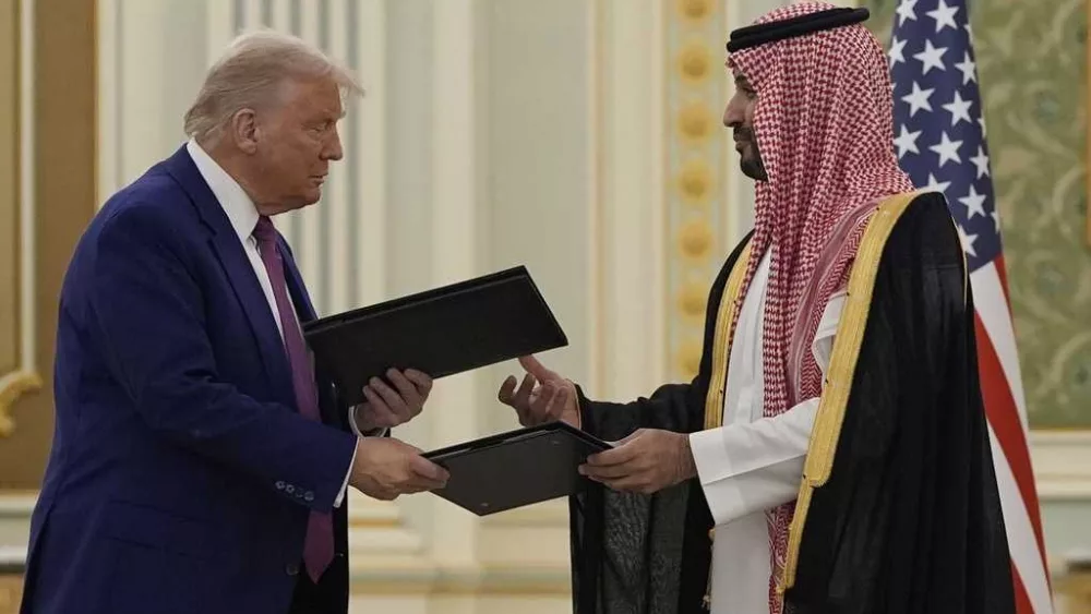 Trump and Saudi crown prince sign multiple agreements during Middle East trip