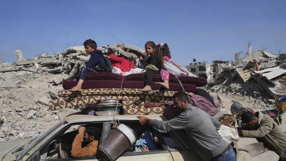 Israeli strikes intensify in Gaza and kill at least 93 people as Trump wraps up visit to region