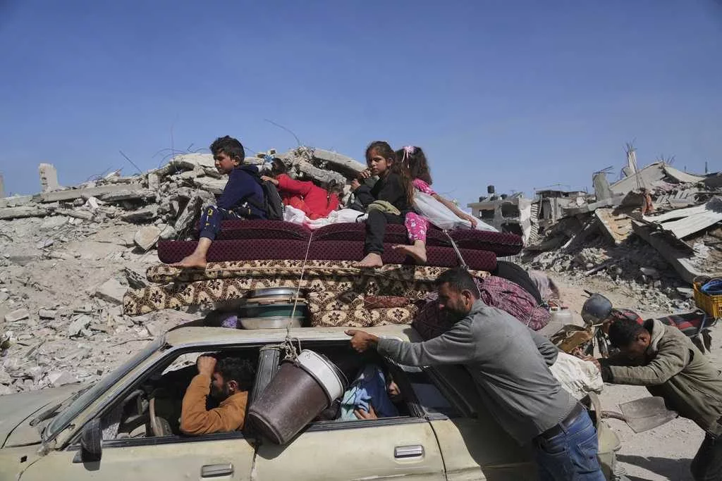 Israeli strikes intensify in Gaza and kill at least 93 people as Trump wraps up visit to region