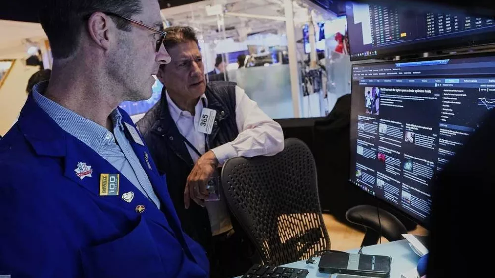 US stocks power within 3% of their record as Wall Street closes out a winning week