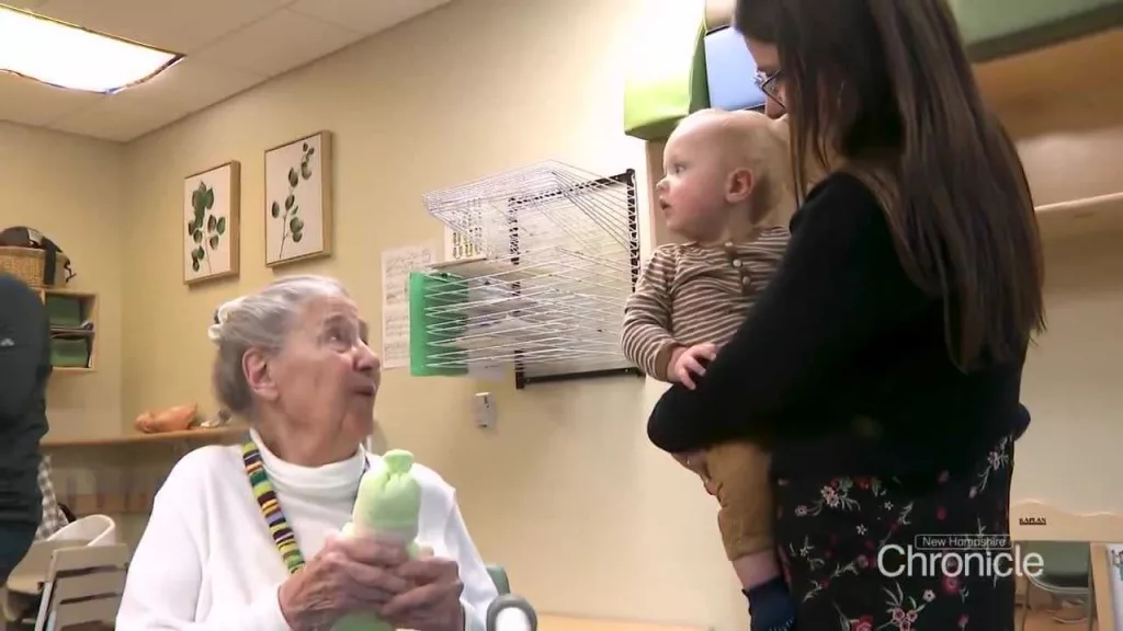 Retirees build bonds with children at on-site learning center as 'grand-friends'