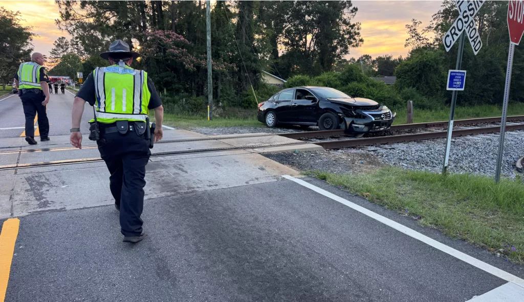 Woman crashes into Fort Stewart railroad tracks after medical emergency
