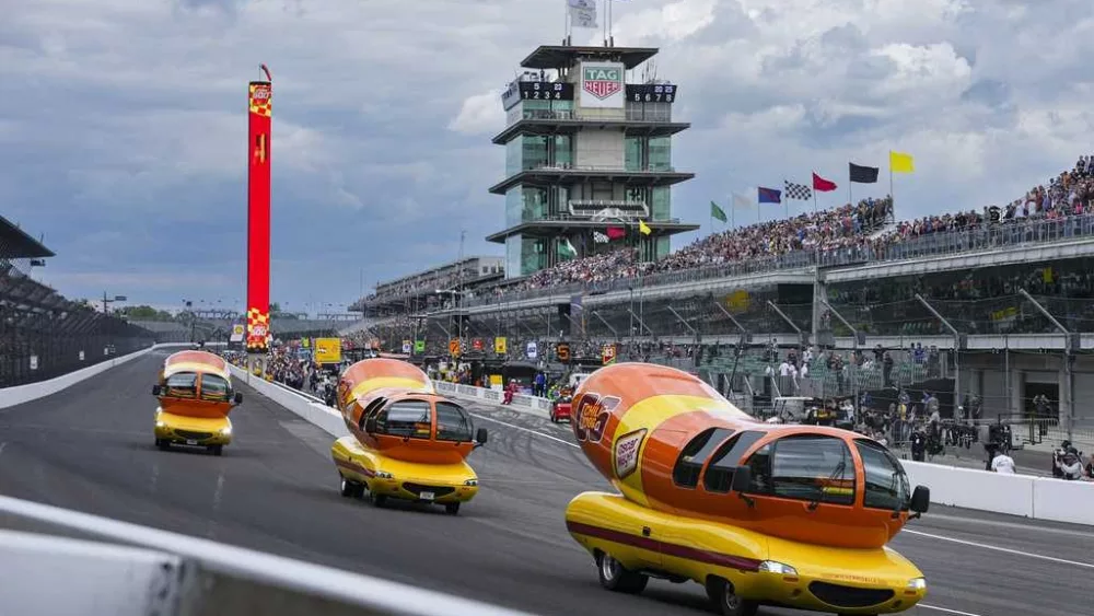 Hot diggity dog! Wienermobiles put on riveting race in Wienie 500 at Indianapolis Motor Speedway