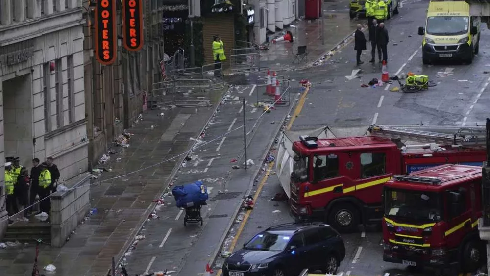 Driver arrested after car plows into celebrating Liverpool fans