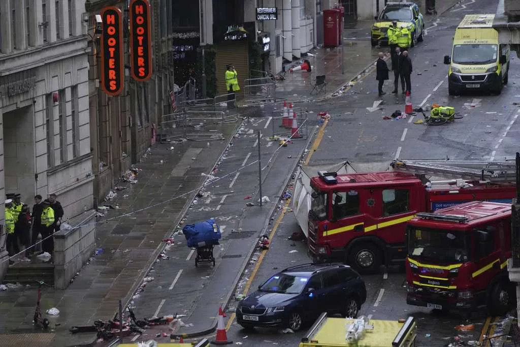 Driver arrested after car plows into celebrating Liverpool fans