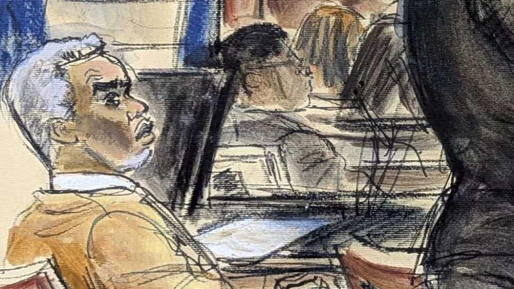 A former aide says Sean 'Diddy' Combs kidnapped her in a plot to kill Kid Cudi