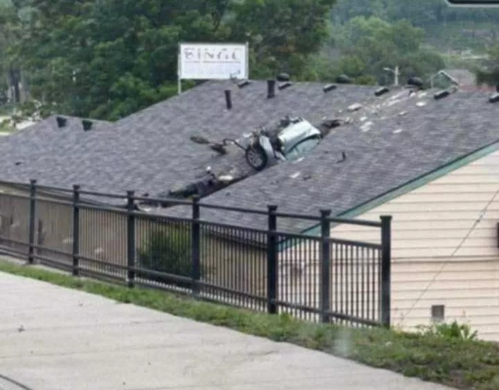 WATCH: Car goes airborne, crashes into roof of veterans hall