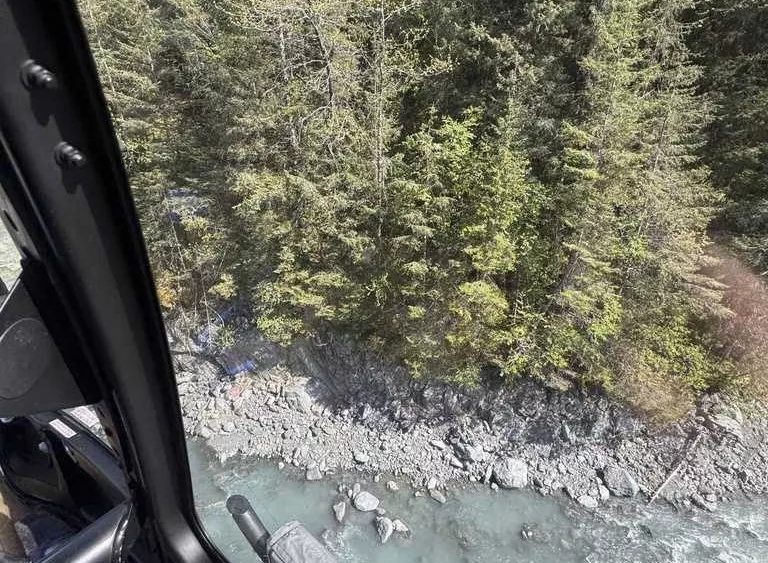 Alaska man unscathed after being pinned for three hours by 700-pound boulder in glacier creek