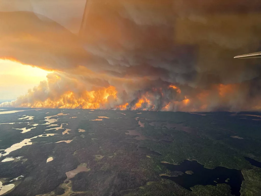 Smoke to pour into the US as Canada wildfires force evacuations