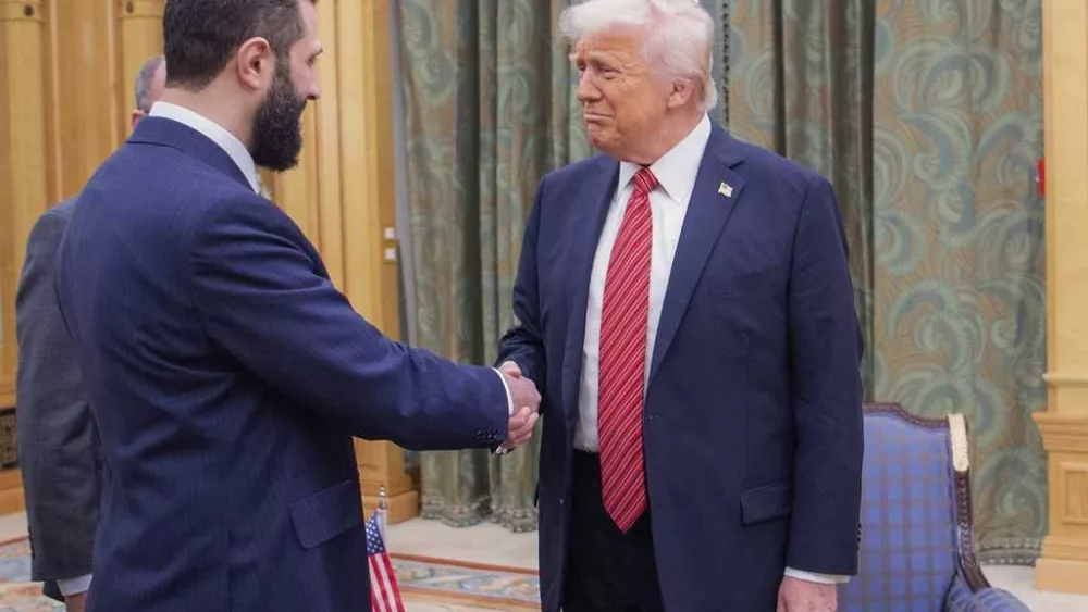 Trump signs an executive order ending US sanctions on Syria