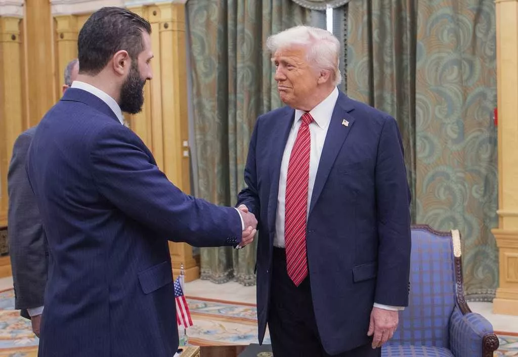 Trump signs an executive order ending US sanctions on Syria