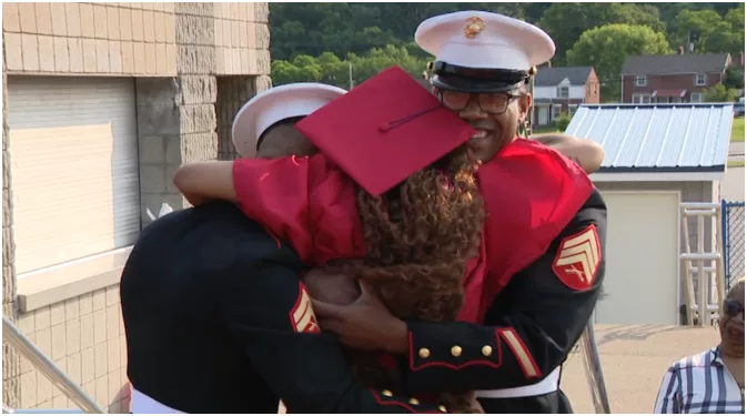 'I'm so happy they are here': Marines surprise sister at graduation practice