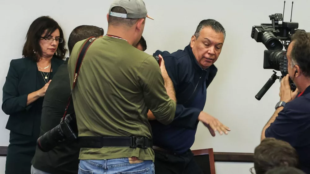 California senator removed from room after interrupting news conference by Kristi Noem