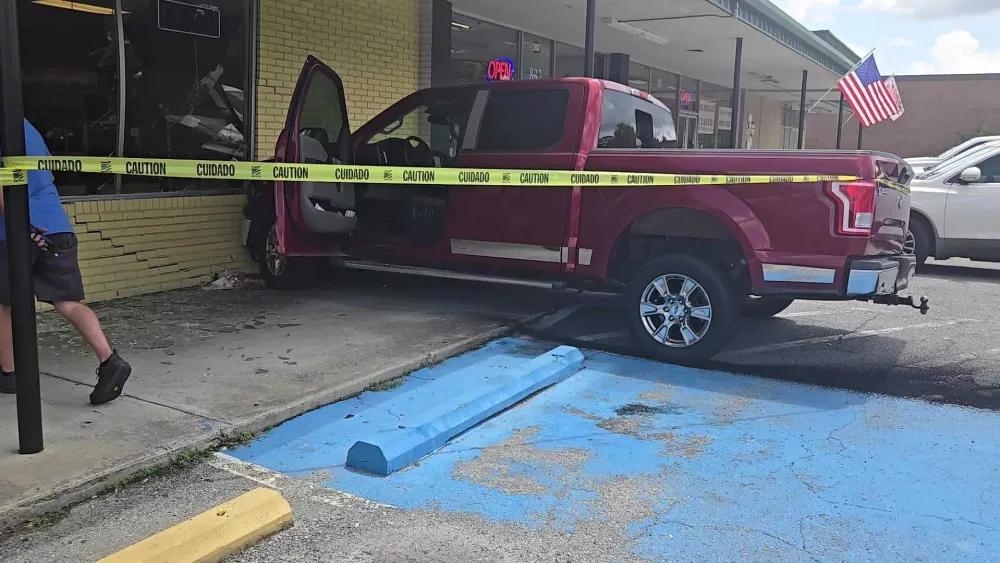 Police, fire crews respond after pickup truck crashes into Savannah shopping center