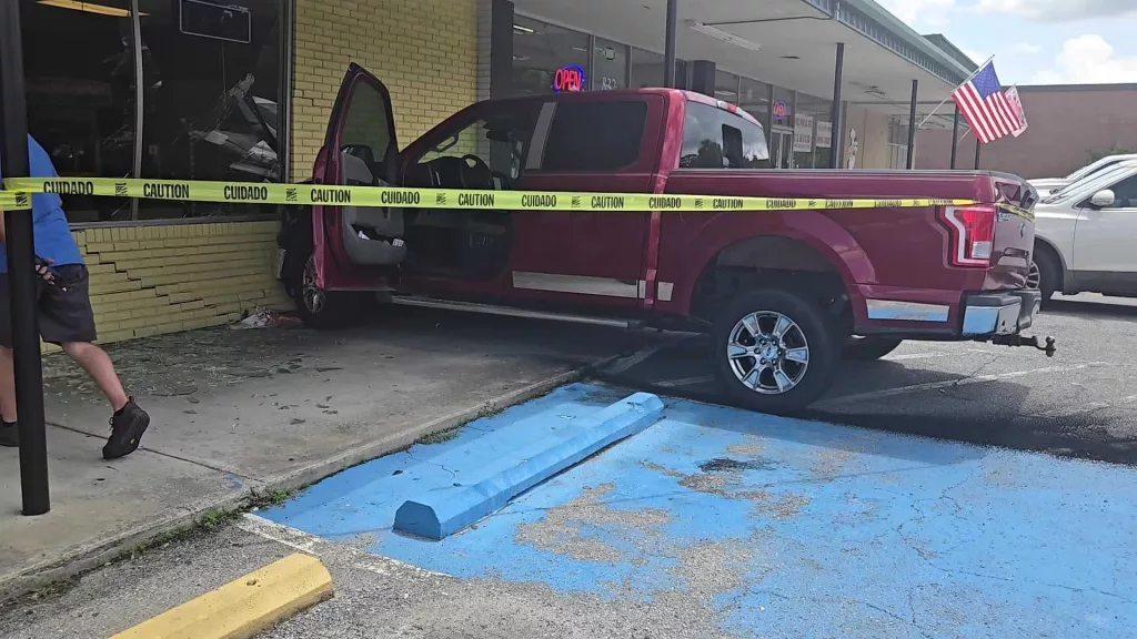 Police, fire crews respond after pickup truck crashes into Savannah shopping center
