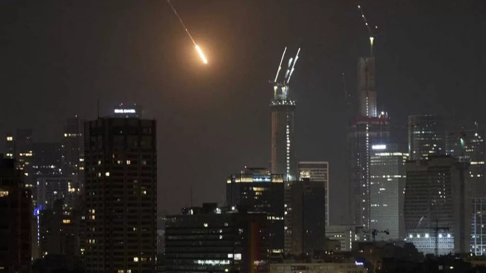 Israel’s defense minister warns 'Tehran will burn' if Iran continues firing missiles