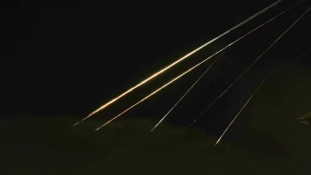 Iran fires another round of missiles at Israel, and explosions are heard in Tehran