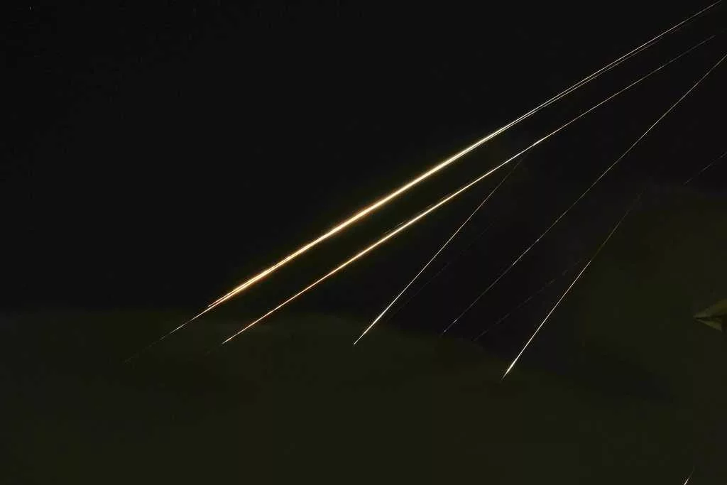 Iran fires another round of missiles at Israel, and explosions are heard in Tehran