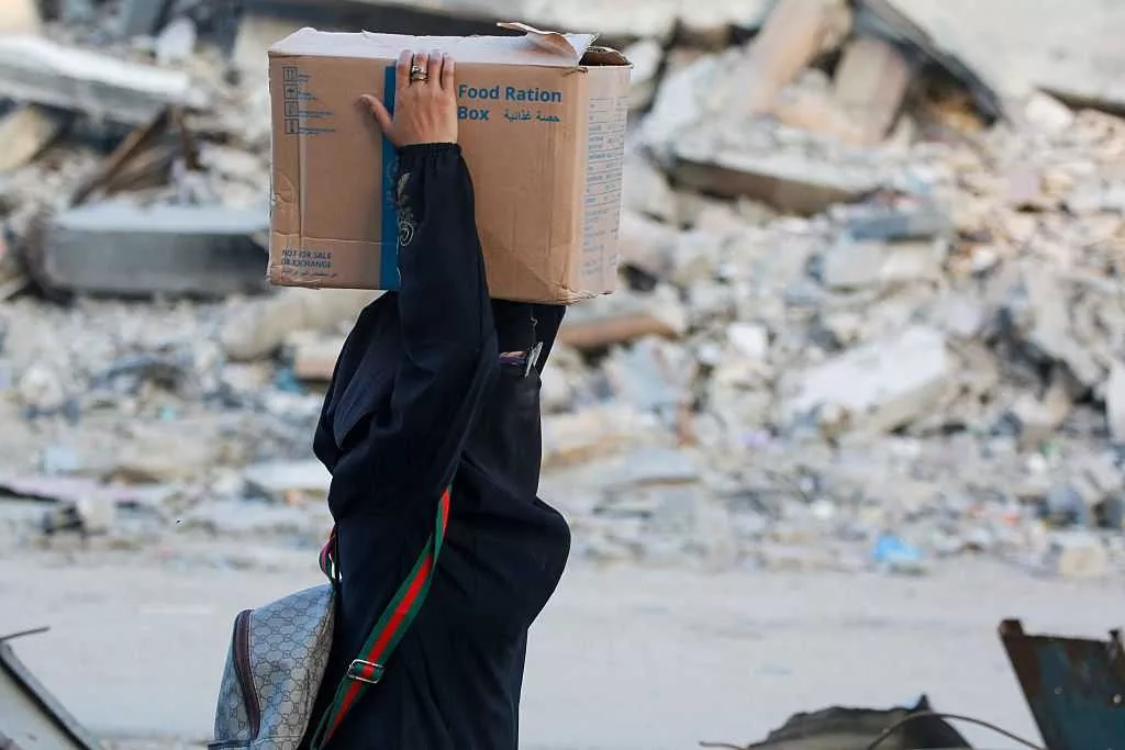 At least 51 Palestinians killed while waiting for aid trucks in Gaza, health officials say