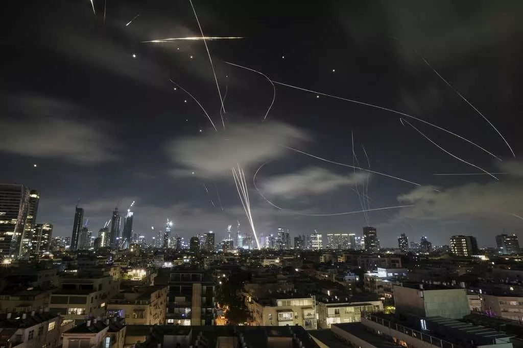 Iran warns US involvement would risk 'all-out war' as new Israeli strikes hit Tehran