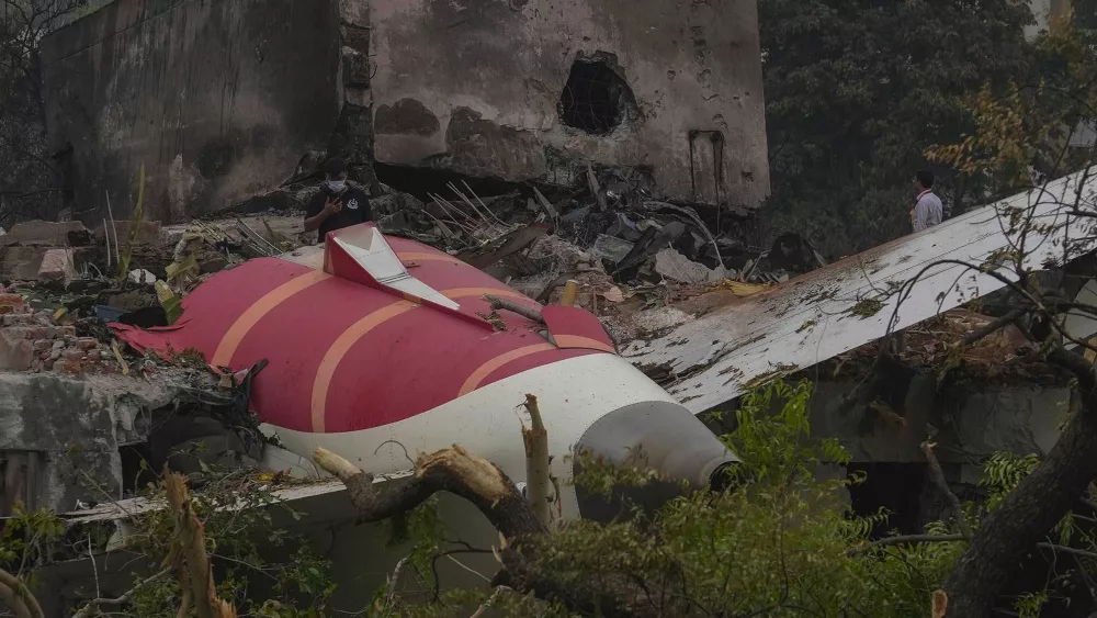 Sole survivor of Air India crash lays his brother to rest after leaving hospital