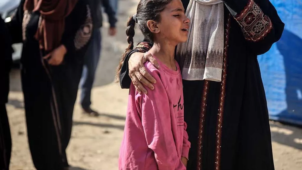 Israel kills 44 waiting for aid as war's death toll passes 56,000, according to authorities