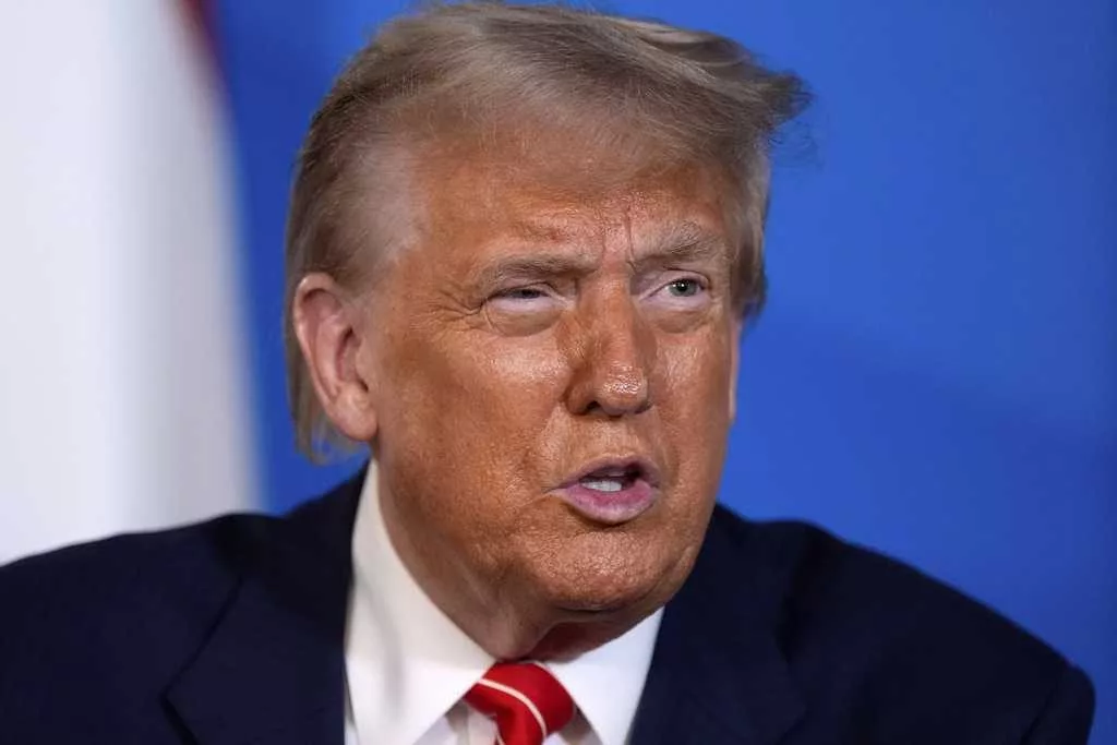 Trump defends US strikes on Iran as intel assessment stirs debate