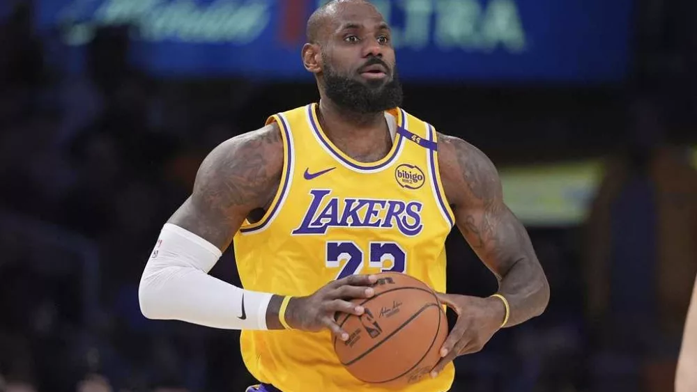 LeBron James formally opts in for a 23rd season, will make $52.6M in 2025-26, AP source says