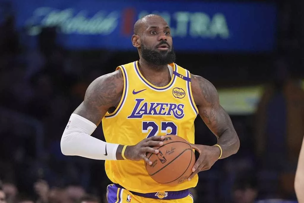 LeBron James formally opts in for a 23rd season, will make $52.6M in 2025-26, AP source says