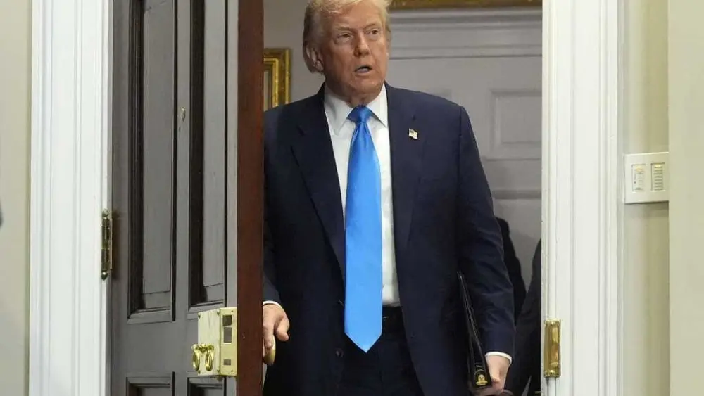Trump signs order imposing new tariffs on a number of trading partners that go into effect in 7 days
