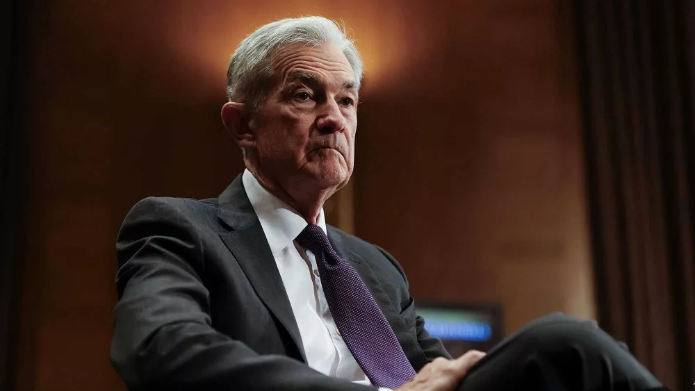 Powell says the Fed would have cut rates this year if it weren’t for tariffs