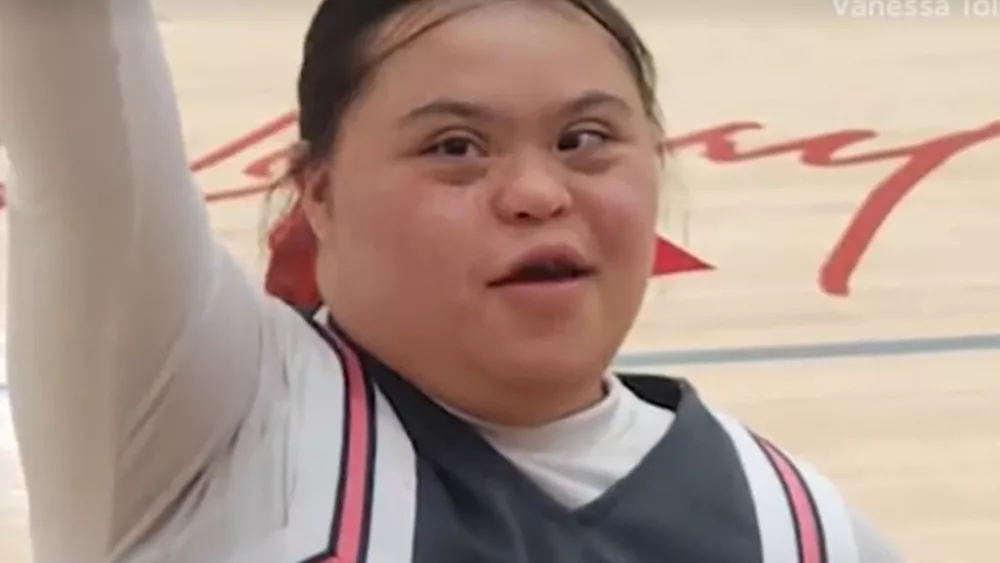 Longtime cheerleader with Down syndrome aiming for college team